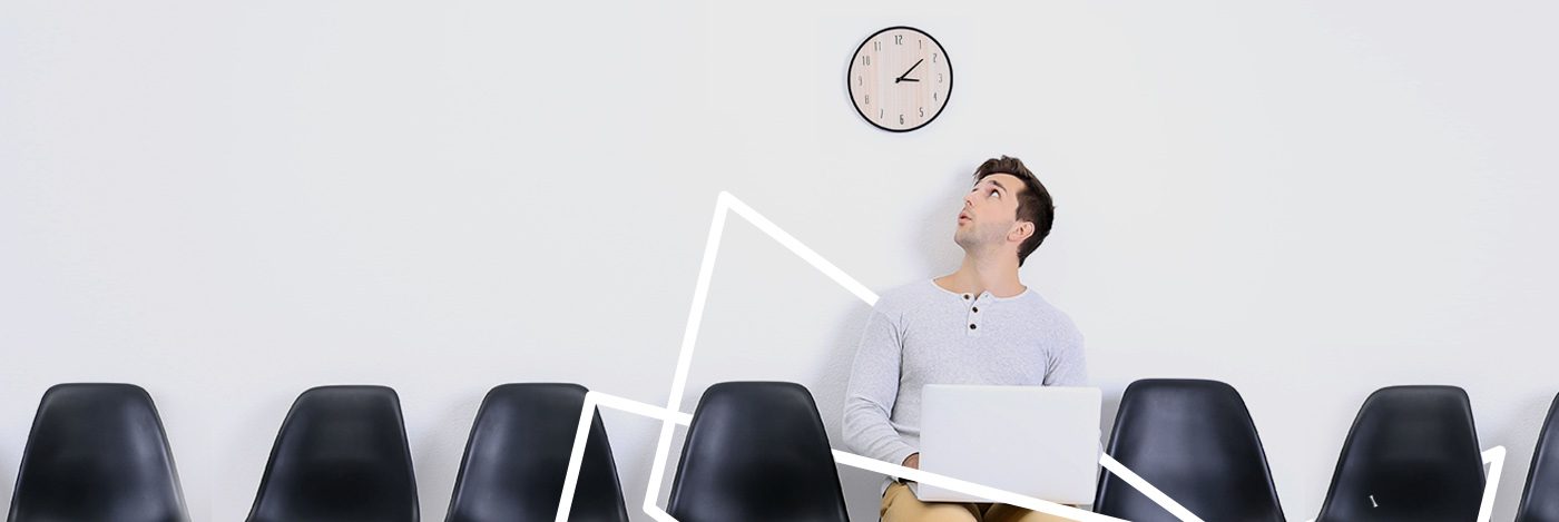 Man sitting in chair, looking up at clock - How much time should I spend on marketing?