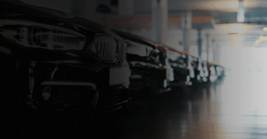 Shiny new cars on a car lot - The No-Nonsense Guide to Incentive Programs for Automotive Manufacturers