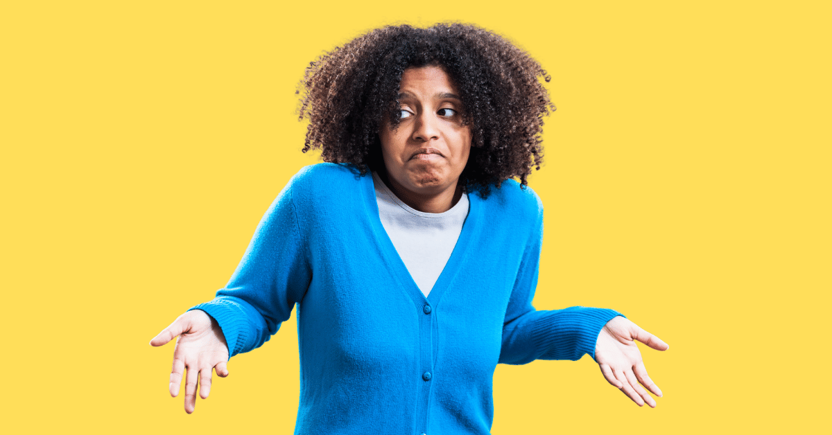 Woman in cardigan shrugging - The Unanswerable Question in Channel Incentives