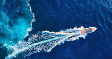 Speedboat traveling in the water, seen from above - For case study on marine manufacturer's incentive program engagement